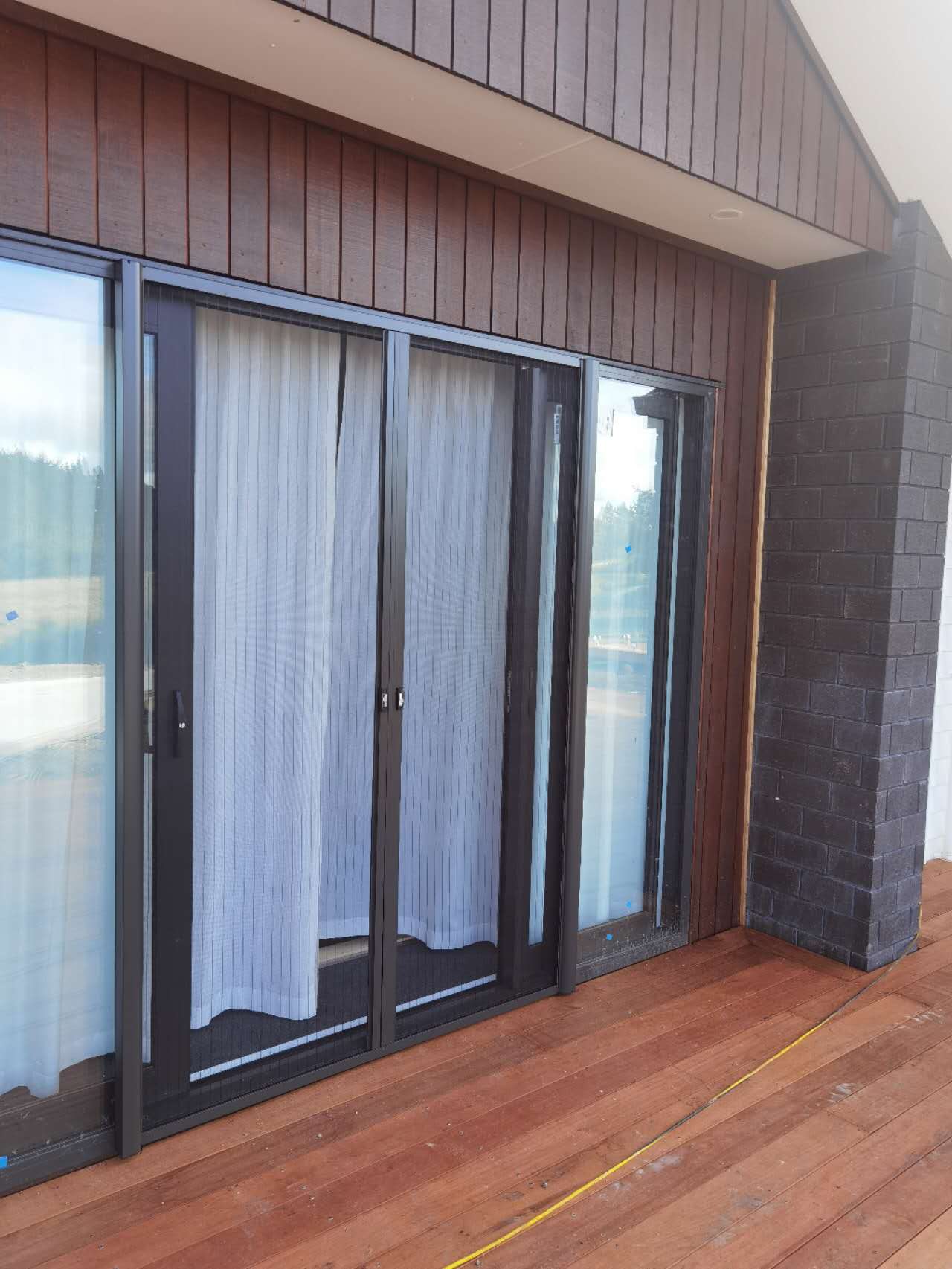 Moore Deckard Japanese Style Central Opening Folding Retractable Screen Doors With Alloy Aluminum Frame And Fiberglass Mesh Screen